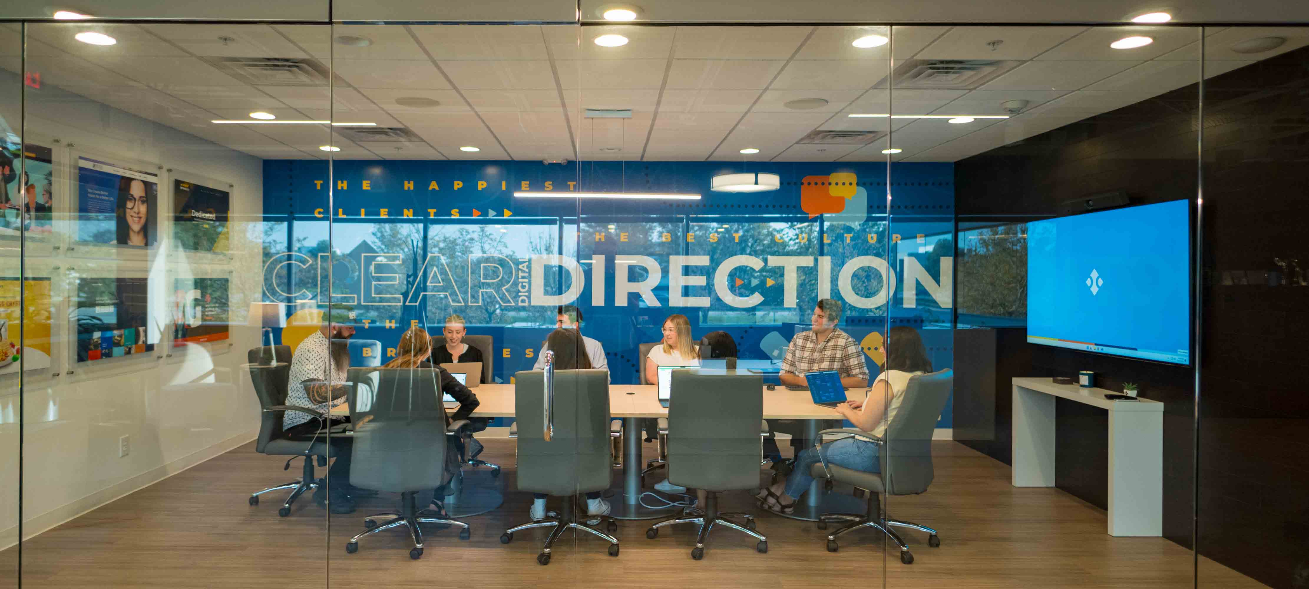 The team in a meeting room.